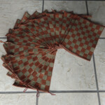 En hel vifte af grydelapper, vævet i cottolin